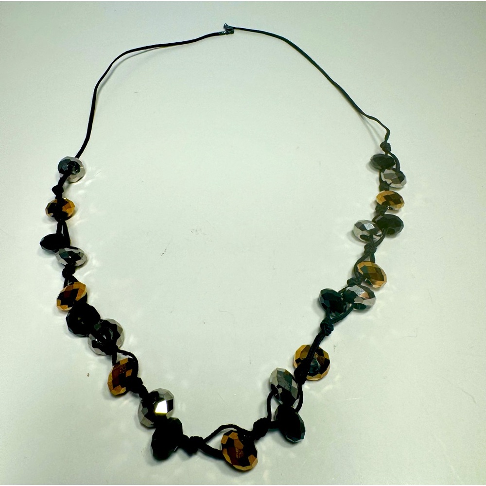 Necklace faux rhinestones and twine cord twisted style between stones